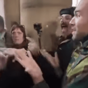 English Ned (camera) trying to get int STW meeting Manchester